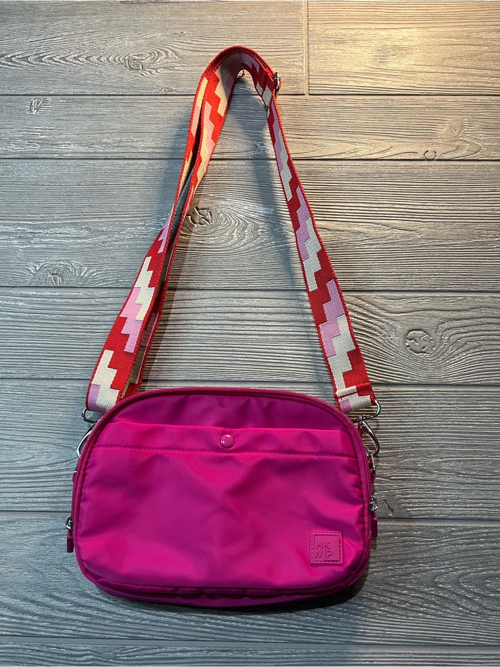 Bright Pink Crossbody Bag with Patterned Strap